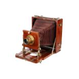 An Unmarked French Mahogany Field Camera, 5x7”, with Rectilineaire Extra Rapid f/8 13x18 brass lens,