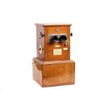 A Le Taxiphoto Stereo-Classeur Table Top Revolving Stereoscopic Viewer, in solid mahogany, body, VG,