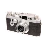 A Leica IIIg Rangefinder Camera, 1959, chrome, serial no. 981299, with Leitz Summaron f/3.5 35mm