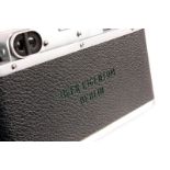 A Leica IIIb Rangefinder Camera, chrome, serial no. 333646, with Leitz Elmar f/3.5 50mm lens,