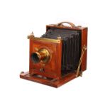 An Unmarked Mahogany Field Camera, 4½x6¼, with unmarked f/8 brass lens, G, bellows require