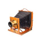 An Unmarked Continental Mahogany Field Camera, serial no. 6528, 4½x6¼, with Clement & Gilmer