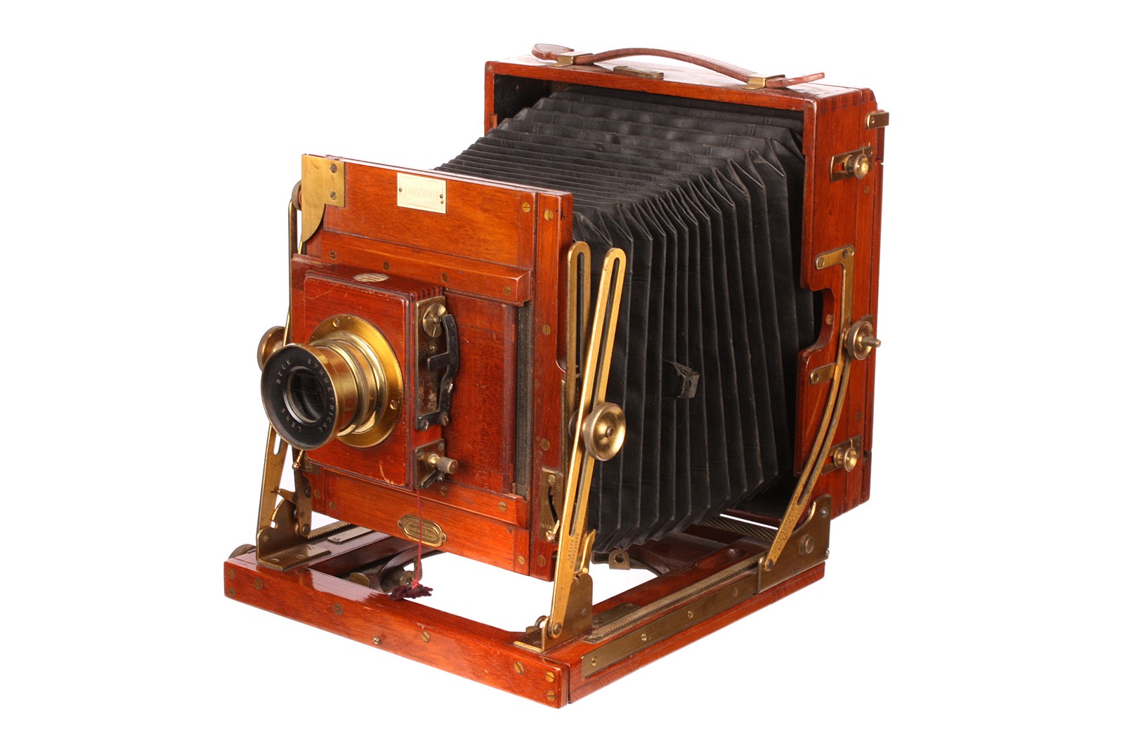 A Sanderson Tropical Mahogany Field Camera, 4½x6¼, with Beck Symmetrical f/8 brass lens, body, G,