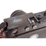 A Leica M4-2 Rangefinder Camera, black, serial no. 1503263, with Leitz Summilux f/1.4 50mm lens,