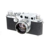 A Leica IIIc Rangefinder Camera, 1948/50, chrome, sharkskin, serial no. 478757, with Leitz