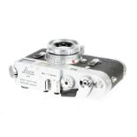 A Leica M4 Rangefinder Camera, 1966, chrome, serial no. 1176553, with Leitz Elmar f/2.8 50mm lens,