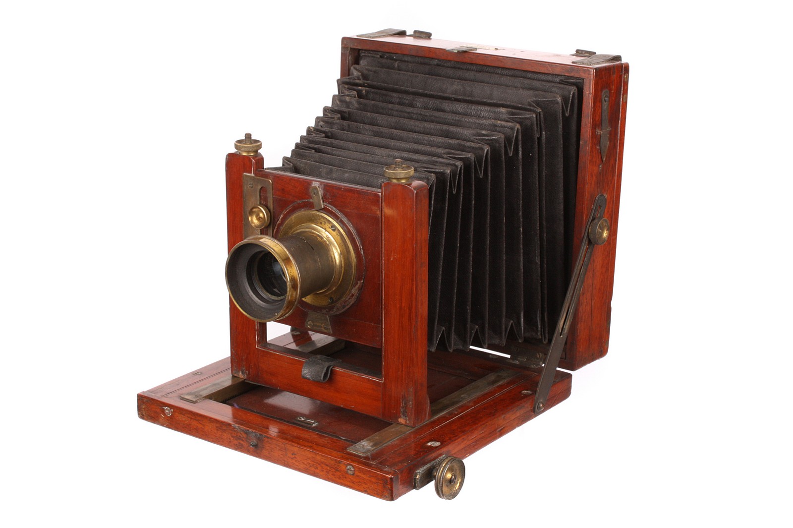 A C. C. Vevers Mahogany Field Camera, 4½x6¼, with C. C. Vevers 7x5” Waterhouse-stop brass lens,