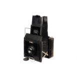 A Zeiss Ikon Miroflex A 859/3 Camera, 3½x4½, with Carl Zeiss Jena Tessar f/4.5 150mm lens, black,