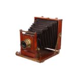 An Etah Mahogany Field Camera, 4½x6¼, with Beck Symmetrical f/8 brass lens, body, G, lens, VG,