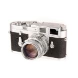 A Leica M3 Rangefinder Camera, 1960, chrome, serial no. 1000392, with Leitz Summicron f/2 50mm lens,