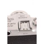 A Leica IIIc Rangefinder Camera, chrome, serial no. 376970, with Leitz Summitar f/2 50mm lens,