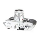 A Leica M4 Rangefinder Camera, 1967, chrome, serial no. 1176495, with Leitz Summicron f/2 50mm lens,