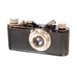 A Leica Model Ic Camera, 1930, with folding 13.5cm finder mask, black, serial no. 50206, with