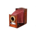An Early Unmarked Mahogany Box Camera, with rotating body, circa 1880, 5x8”, body, G, brass bound,
