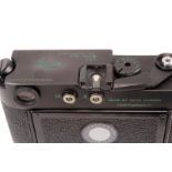 A Leica M4-P Rangefinder Camera, black, serial no. 1549718, with Leitz Elmar f/2.8 50mm lens,