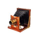 An E & T Underwood ‘The Club’ Mahogany Field Camera, 5x6¼, with E & T Underwood Rapid Rect 1/2 Plate