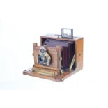 An Unmarked Mahogany Box Camera, possibly French, 3½x4½, with unmarked f/8 brass lens, in Bausch &