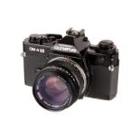 An Olympus OM-4 Ti SLR Camera, black, serial no. 1187125, with Olympus f/1.4 50mm lens, black,