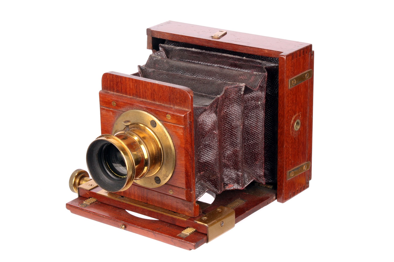 An Unmarked Mahogany Quarter-Plate Camera, 3x4”, with unmarked brass lens, body, G, lens, F-G,