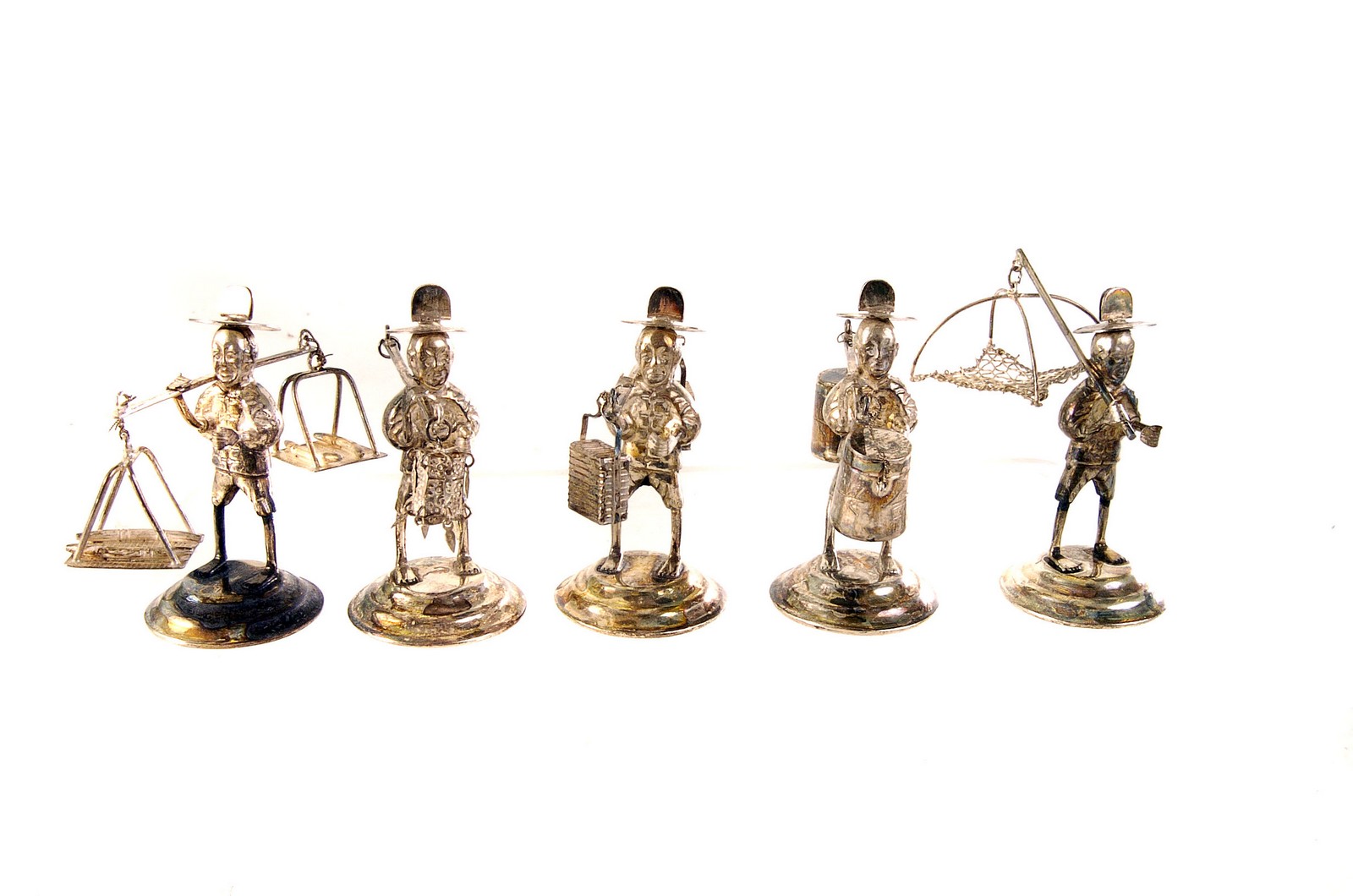 A set of Chinese silver figures, comprising males carrying water/milk pales, farmers and various