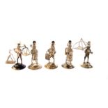 A set of Chinese silver figures, comprising males carrying water/milk pales, farmers and various