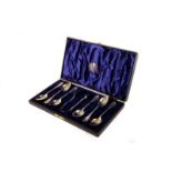 A cased set of Victorian tea spoons with tongs, in Thomas Kent fitted box, marked Chester 1896