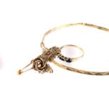 An 18ct gold broken bangle, together with three yellow metal items, including a gem set ring, a knot