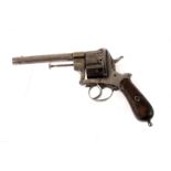 An unusual vintage ten shot revolver, the revolving loading movement with ten individual bullet