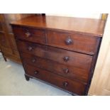 A Georgian mahogany chest of drawers, having two short over three long drawers, on shaped feet,