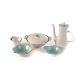 An extensive Poole pottery twin tone green and seagull breakfast and dinner service, comprising cups