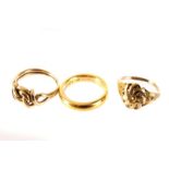 Three gold rings, including a 22ct gold wedding band, an 18ct gold knot ring marked Chester, and