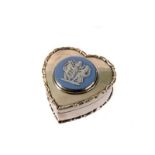 An Edwardian silver heart shaped pill box, with central circular plaque is 'Jasper Ware' of the '
