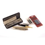 A Parker 45 pen and pencil set, together with a Parker 61 ball pen, three yard-o-lead pencils, two