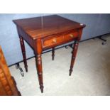 A mahogany side table, having single drawer to the front,  on turned legs
