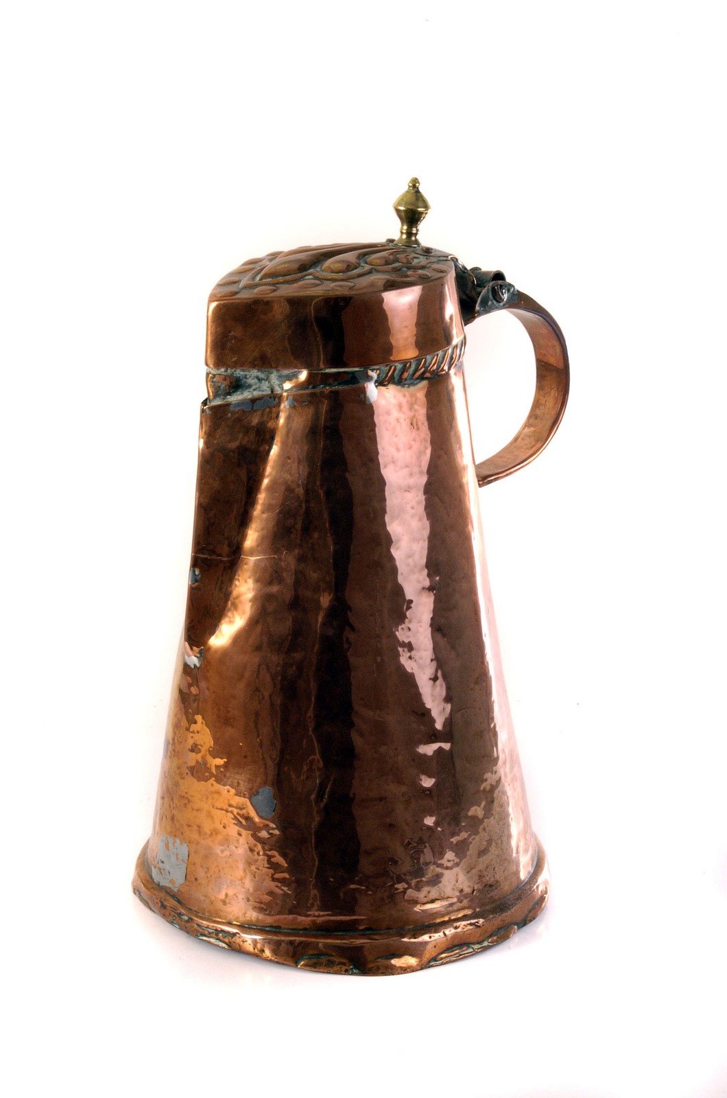 A large 19th century Arts and Crafts style copper lidded jug, with embossed lid, together with a