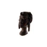 An African carved figure of a woman's head, approx 19cm H