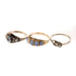 Three 9ct gold rings, a forget me not ring, a five stone opal ring, and another (3)