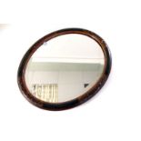 Two 1920s oval wall mirror, one with carved floral decoration and the other in the Chinese taste (