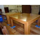 A pair of modern pollard oak coffee tables, approx 72cm by 72cm