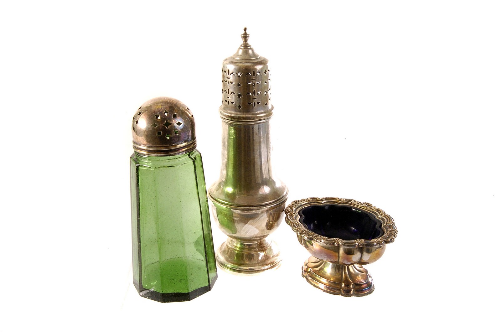 A selection of silver and plated items, to include a sifter, a cruet set, a small vase and more (