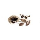 Two Danish silver brooches, both of natural design, together with a pair of silver floral
