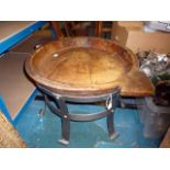 An oak dough pan, on iron stand, both circular in shape