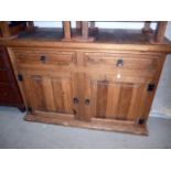 A reclaimed pine sideboard, having two drawers to top above two door cupboard, approx 119cm W