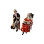 A Royal Doulton figure of 'The Doctor', 2858, together the Royal Doulton figure 'The Judge' 2443 (