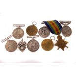 A collection of WWI and WWII medals, including WWI War and Victory medals for73590 PTE J.E