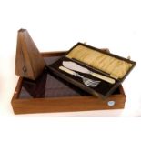 A presentation display case, once used for pens, together with a J.T.L Metronome and a cased fish