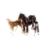 A collection of Beswick horse figures, including a heavy horse, horses and foals etc, together