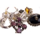 A small collection of silver and white metal jewellery, including gem set pendants and chains,