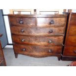 A Georgian bow fronted chest of drawers, having two short over three long graduated drawers, on