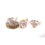 An Adderley 'Lowestoft' pattern six setting tea set, comprising cups and saucers, milk jug, sugar